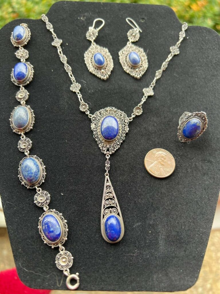 Peruzzi lapis lazulli jewelry set. Earrings, bracelet, necklace and ring.